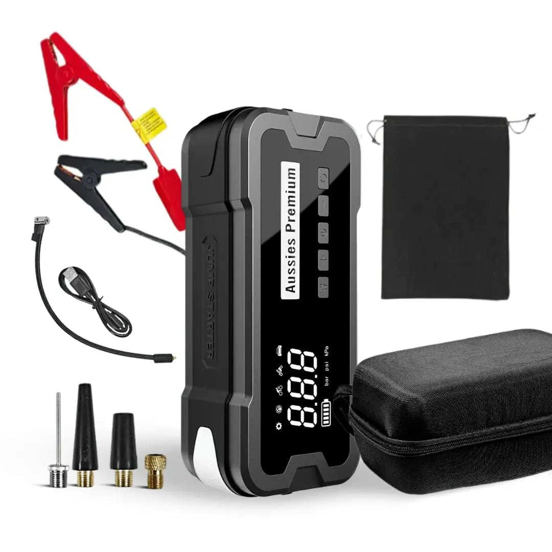 4-In-1 Jump Start Tyre Inflator, a black and grey compact power unit with digital display, jumper clamps, cables, adaptors and carrying case.