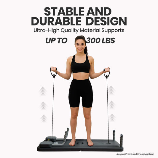 9-in-1 Fitness Pilate Reformer Board in black with a textured platform, resistance bands, handles and upright posts.