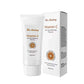 Dark Spot Whitening Cleanser in white tubes and cartons, featuring brown and orange Vitamin C branding and citrus logo