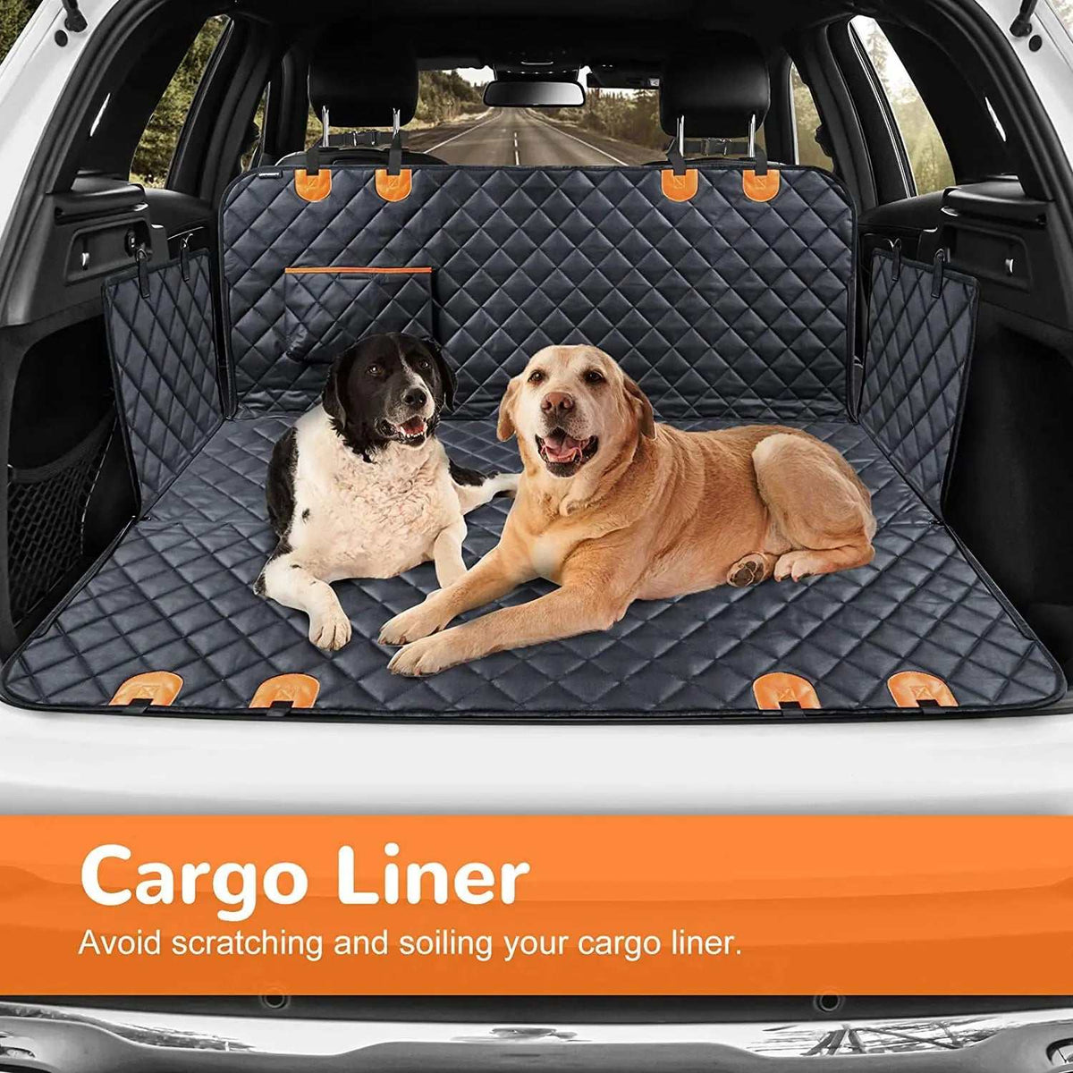 Pet Waterproof Seat Cover in black quilted fabric with orange fastening tabs, fitted as a cargo liner with two dogs
